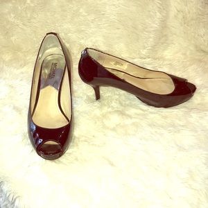 Michael Kors black patent peep toe platform heels